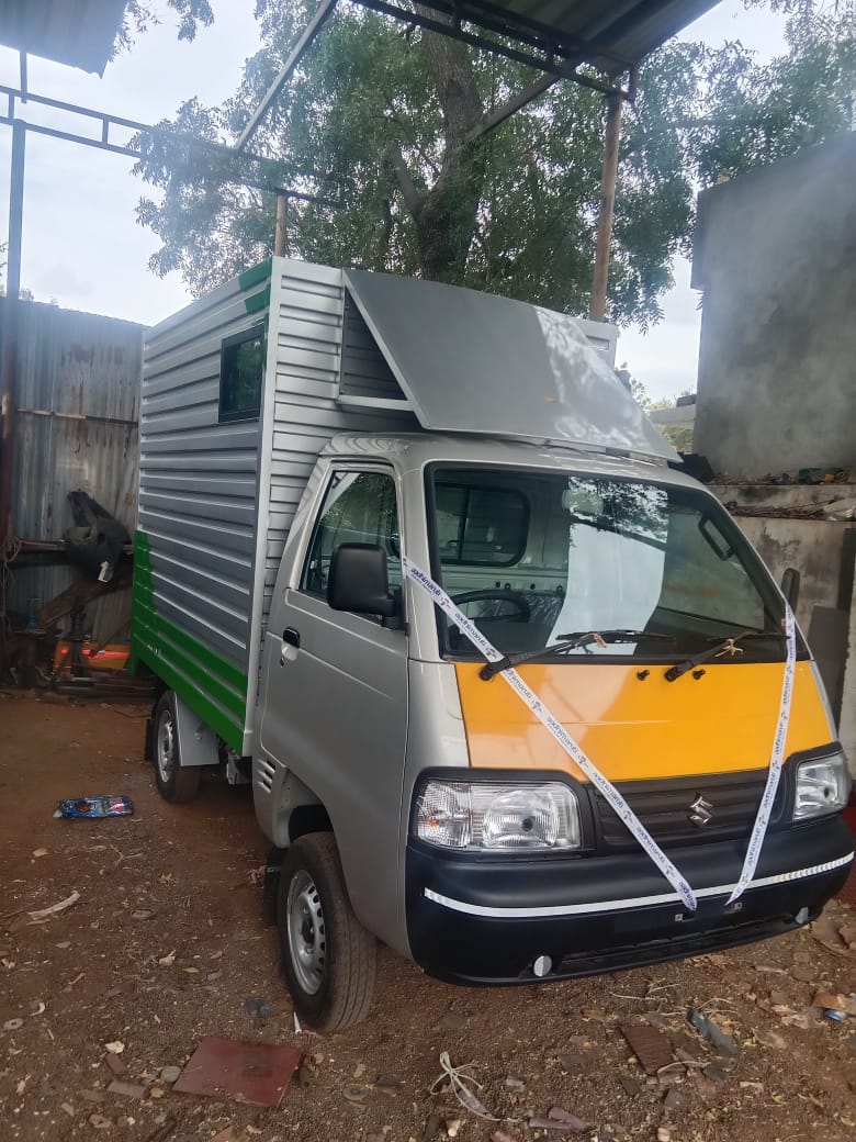 Front view of container truck with yellow cabin